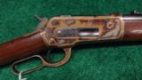 THE FINEST COLOR CASE HARDENED MODEL 1886 SADDLE RING CARBINE IN THE VERY DESIRABLE 50 EX - 1 of 9