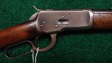 WINCHESTER MODEL 1892 ROUND BBL RIFLE WITH BUTTON MAG IN 38 WCF - 1 of 13