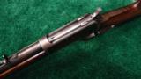 WINCHESTER MODEL 1892 ROUND BBL RIFLE WITH BUTTON MAG IN 38 WCF - 4 of 13