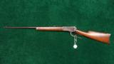 WINCHESTER MODEL 1892 ROUND BBL RIFLE WITH BUTTON MAG IN 38 WCF - 12 of 13