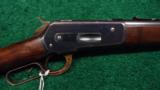 THE FINEST WINCHESTER 1886 BLUED FRAME SADDLE RING CARBINE IN 50-110 EXPRESS - 1 of 14