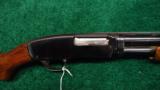  WINCHESTER MODEL 42 410 PUMP ACTION SHOTGUN WITH A SIMMONS RIB - 1 of 13