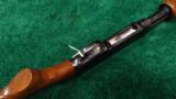  WINCHESTER MODEL 42 410 PUMP ACTION SHOTGUN WITH A SIMMONS RIB - 5 of 13