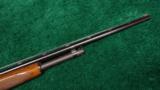  WINCHESTER MODEL 42 410 PUMP ACTION SHOTGUN WITH A SIMMONS RIB - 9 of 13
