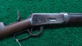 ANTIQUE 1894 WINCHESTER WITH SPECIAL FEATURES - 1 of 15