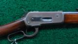WINCHESTER MODEL 1886 RIFLE - 1 of 14