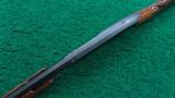 WINCHESTER MODEL 42 410 PUMP ACTION SHOTGUN WITH A SIMMONS RIB - 4 of 13