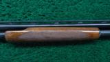 WINCHESTER MODEL 42 410 PUMP ACTION SHOTGUN WITH A SIMMONS RIB - 5 of 13