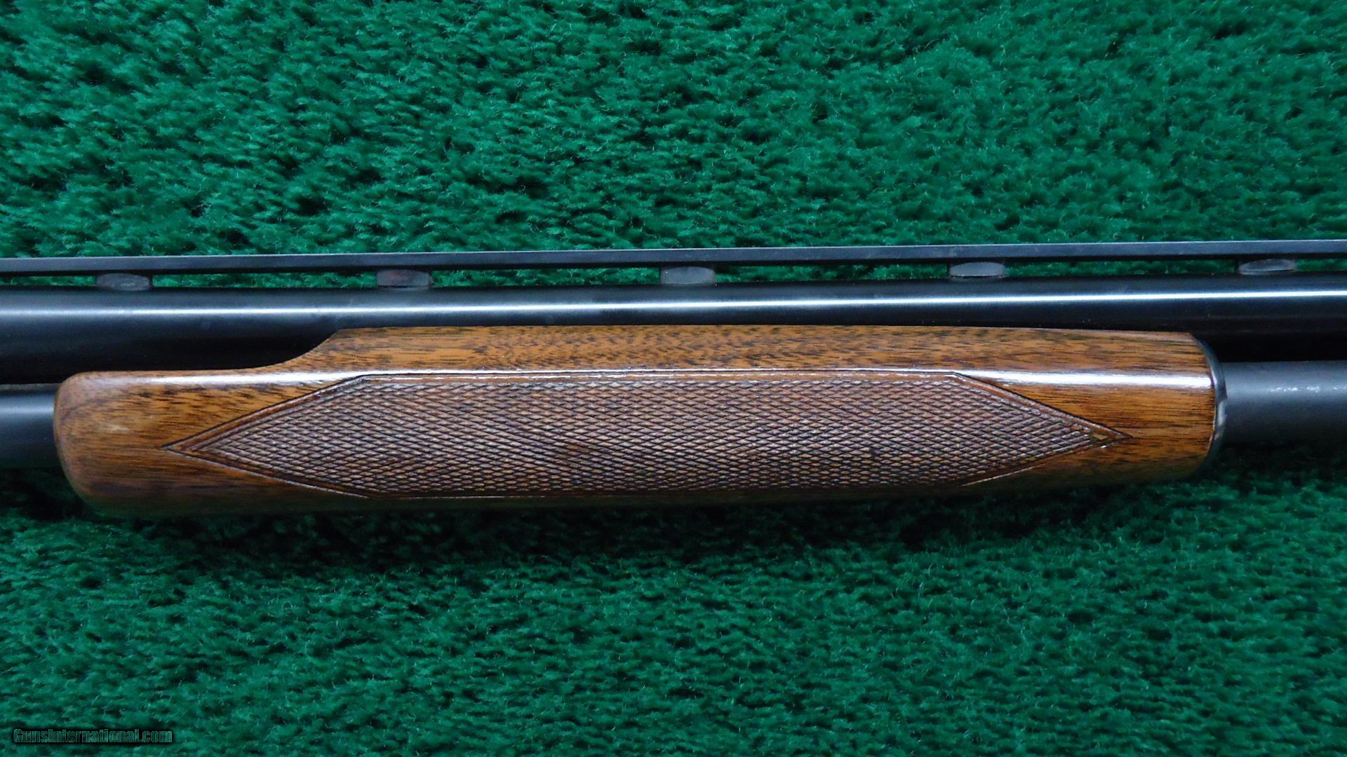 WINCHESTER MODEL 42 410 PUMP ACTION SHOTGUN WITH A SIMMONS RIB