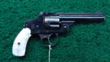  SMITH & WESSON SAFETY HAMMERLESS 4TH MODEL 38 CALIBER REVOLVER - 1 of 11