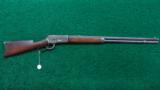 WINCHESTER MODEL 1886 RIFLE WITH OCTAGON BARREL - 16 of 16