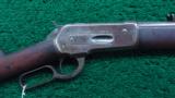 WINCHESTER 1886 ROUND BARREL RIFLE IN 40-65 WCF - 1 of 15