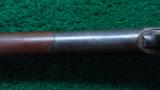 ANTIQUE WINCHESTER 1886 RIFLE
- 10 of 15