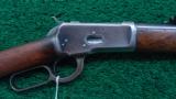 WINCHESTER MODEL 1892 ROUND BBL RIFLE WITH BUTTON MAG - 1 of 15