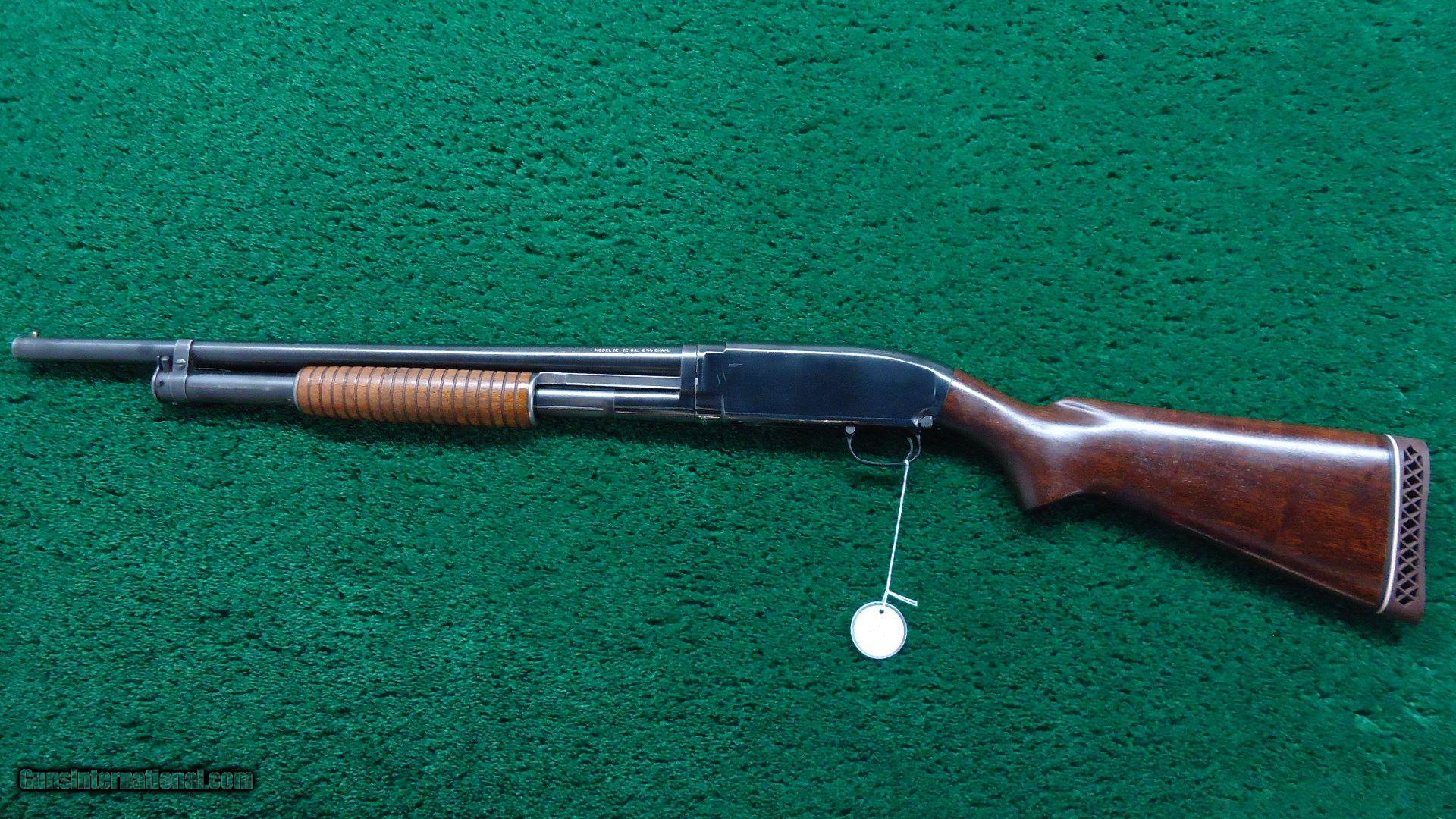 12 gauge winchester model shotgun.