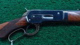 WINCHESTER 1886 DELUXE RIFLE IN CALIBER 45-90 - 1 of 26