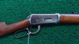 WINCHESTER 1894 FIRST MODEL RIFLE WITH SCARCE ROUND BARREL IN CALIBER 38-55 - 1 of 17