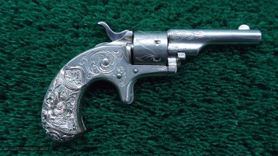 FACTORY ENGRAVED CASED COLT OPEN TOP 22 CALIBER REVOLVER