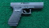 GLOCK 20C IN 10MM CALIBER - 1 of 15