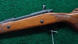 WINCHESTER MODEL 70 RIFLE IN CALIBER 375 H & H MAG - 2 of 19