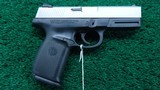 SMITH & WESSON MODEL SW40VE PISTOL IN 40 CALIBER - 1 of 11