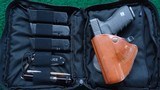 GLOCK 21 IN 45 ACP IN CARRY BAG WITH EXTRA MAGS - 12 of 14