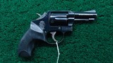 SMITH & WESSON MODEL 10-5 REVOLVER WITH BELT HOLSTER IN CALIBER 38 S&W SPECIAL - 1 of 17