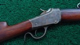 1885 WINCHESTER LO-WALL RIFLE IN CALIBER 25 WCF - 1 of 21