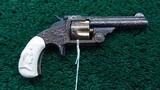SMITH & WESSON 32 SINGLE ACTION ENGRAVED REVOLVER WITH CARVED IVORY GRIPS - 1 of 19