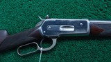 WINCHESTER MODEL 1886 LIGHT WEIGHT RIFLE IN 33 WCF - 1 of 19