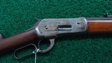 WINCHESTER MODEL 1886 RIFLE IN CALIBER 38-70 - 1 of 19