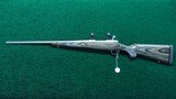 WINCHESTER MODEL 70 FEATHER WEIGHT STAINLESS STEEL RIFLE IN CALIBER 270 WSM - 19 of 21