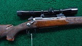WINCHESTER MODEL 70 PRE-64 FEATHER WEIGHT BOLT ACTION RIFLE IN 264 MAG - 1 of 22