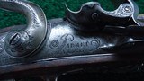 FANTASTIC SILVER MOUNTED ENGRAVED GOLD ACCENTED AND RELIEF CARVED DOUBLE BARREL FLINTLOCK SHOTGUN BY PIRMET of PARIS - 9 of 24
