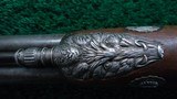 FANTASTIC SILVER MOUNTED ENGRAVED GOLD ACCENTED AND RELIEF CARVED DOUBLE BARREL FLINTLOCK SHOTGUN BY PIRMET of PARIS - 13 of 24