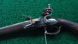 FANTASTIC SILVER MOUNTED ENGRAVED GOLD ACCENTED AND RELIEF CARVED DOUBLE BARREL FLINTLOCK SHOTGUN BY PIRMET of PARIS - 2 of 24