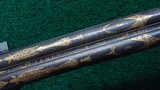 FANTASTIC SILVER MOUNTED ENGRAVED GOLD ACCENTED AND RELIEF CARVED DOUBLE BARREL FLINTLOCK SHOTGUN BY PIRMET of PARIS - 14 of 24