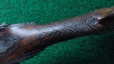 FANTASTIC SILVER MOUNTED ENGRAVED GOLD ACCENTED AND RELIEF CARVED DOUBLE BARREL FLINTLOCK SHOTGUN BY PIRMET of PARIS - 17 of 24