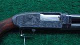 CUSTOM ENGRAVED WINCHESTER MODEL 12 TAKEDOWN SHOTGUN IN 12 GAUGE - 1 of 16