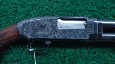 CUSTOM ENGRAVED WINCHESTER MODEL 12 TAKEDOWN SHOTGUN IN 12 GAUGE