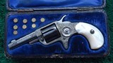 VERY FINE CASED COLT NEW LINE FACTORY ENGRAVED REVOLVER IN CALIBER 22 - 1 of 16
