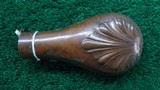 UNMARKED SHELL AND BUSH PATTERN FLASK - 1 of 3