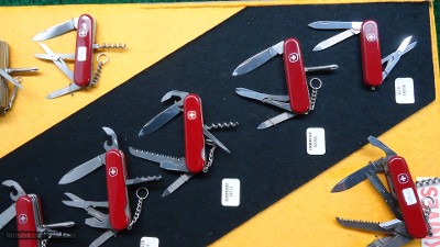 VERY INTERESTING AND UNIQUE FACTORY DISPLAY BOARD WITH 27 SWISS ARMY KNIVES - Image 6 of 7