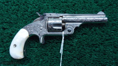 SMITH & WESSON SINGLE ACTION ENGRAVED REVOLVER IN 32 CAL