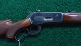 WINCHESTER MODEL 71 DELUXE RIFLE IN 348 WCF - 1 of 20