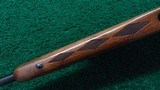 WINCHESTER MODEL 70 IN CALIBER 338 WIN MAGNUM WITH WEAVER SCOPE - 11 of 19