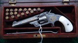 ENGRAVED AND INLAID S&W SINGLE ACTION REVOLVER IN CALIBER 32 IN A KIDDER MARKED CASE