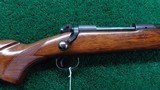 PRE-64 WINCHESTER MODEL 70 RIFLE CHAMBERED IN 300 H&H MAGNUM