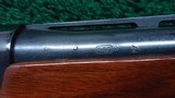 REMINGTON MODEL 1100 12 GAUGE SHOTGUN - 13 of 24