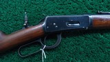 WINCHESTER MODEL 94 SADDLE RING CARBINE CHAMBERED IN 30 WCF - 1 of 24